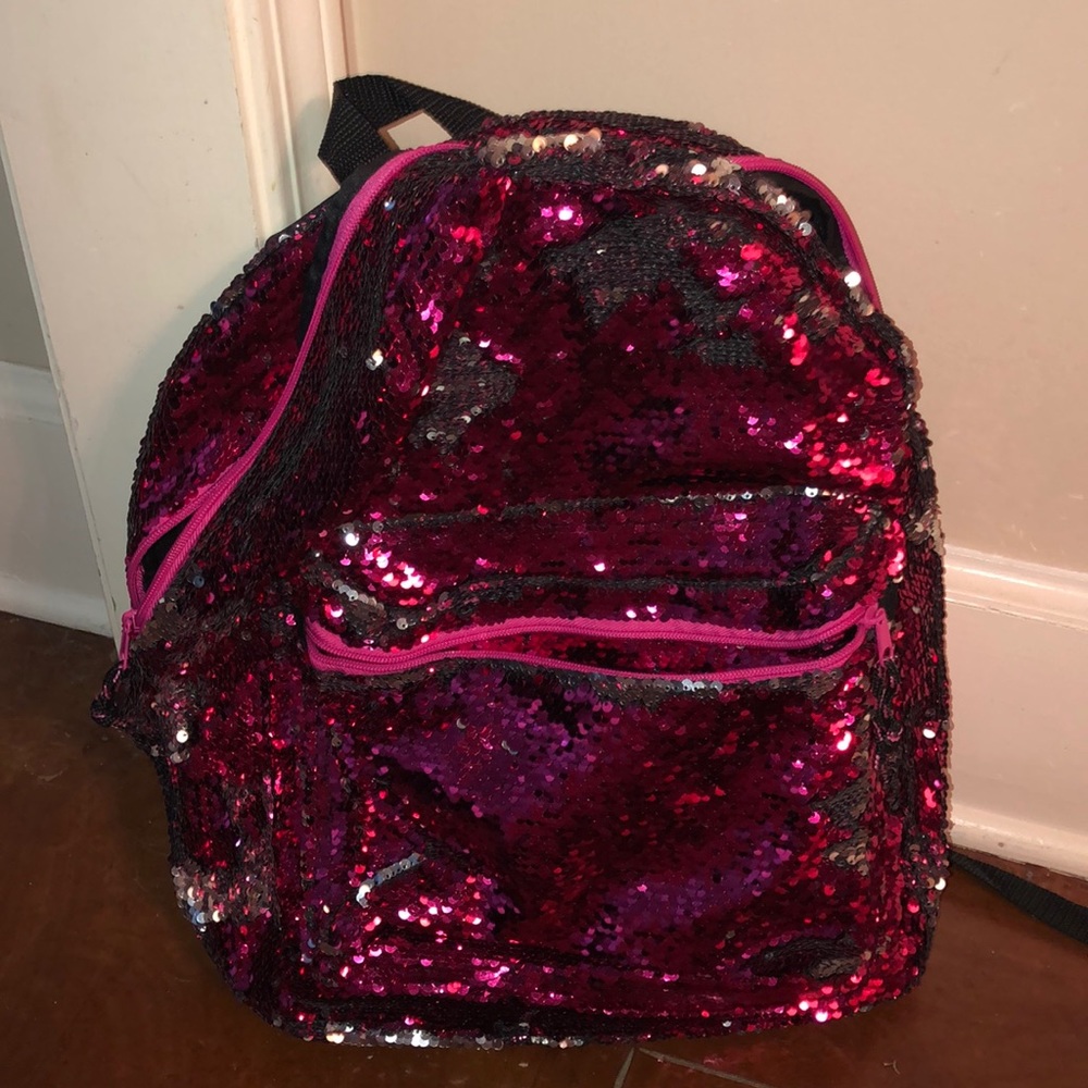 Pink Sparkly book bag.